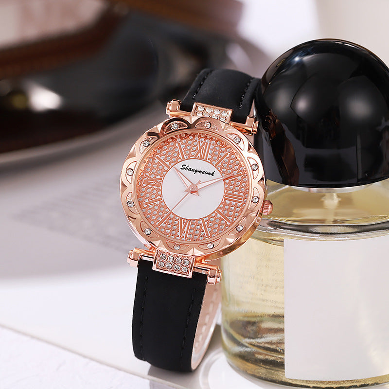 Korean-style quartz watch with a simple leather strap.